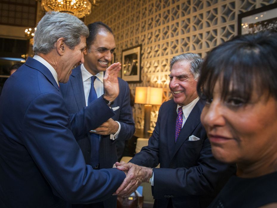 US Secretary of State John Kerry (left) greets Indian businessman Ratan N. Tata with US Secretary of