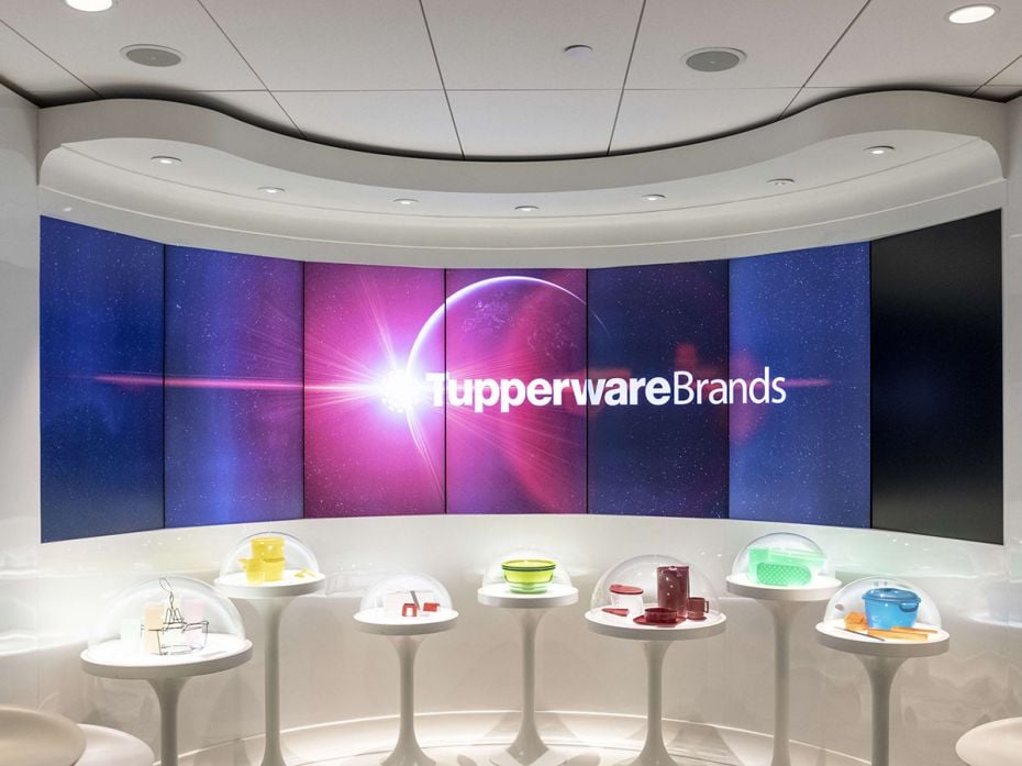 Tupperware Brands' corporate history and product display at the company's headquarters in Florida.
