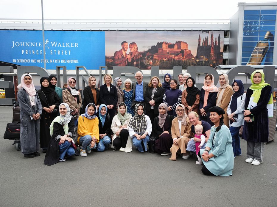 A group of 19 women from Afghanistan, who are now banned from education under the Taliban, pose for 