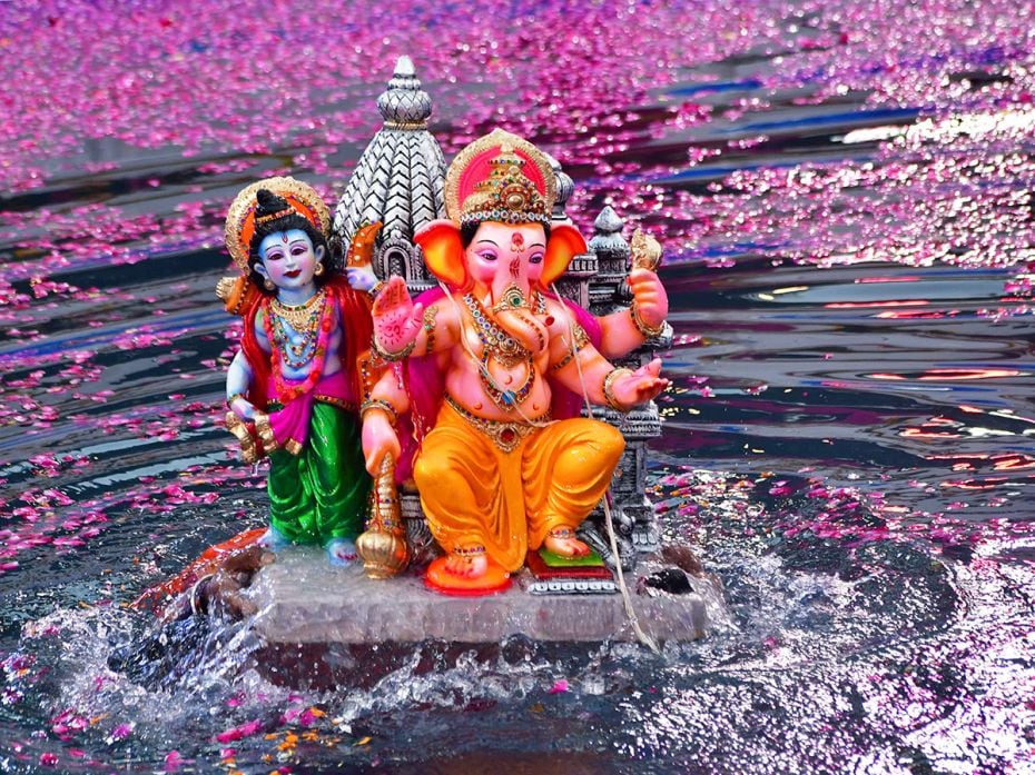 In a surprising variation, Ganesh is accompanied by Lord Ram and temple to his immersion at an artif