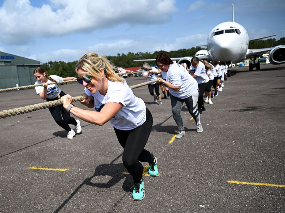 To raise money for their chosen charities, teams participate in the Dorset Plane Pull, hosted by Eur