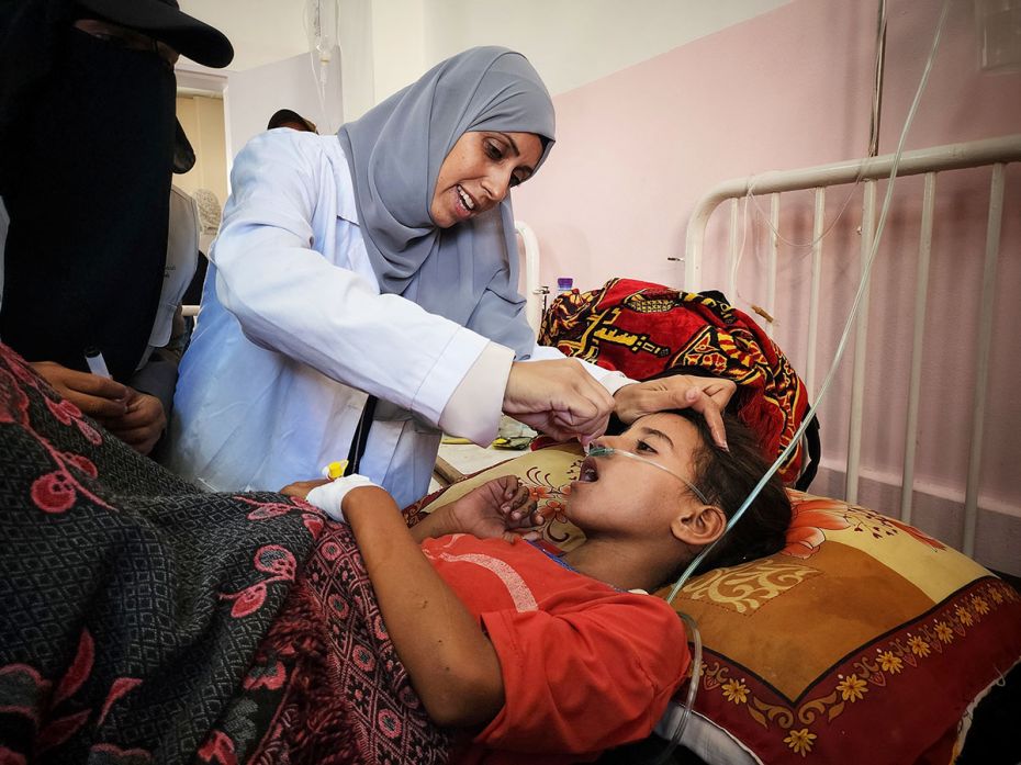 Children receive vaccination from volunteers at Nasser Hospital in Khan Yunis, Gaza, on August 31, 2